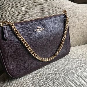 Coach pebbles wristlet in burgundy w gold chain